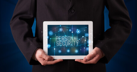 Person holding tablet, security concept