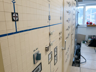 Vintage control and protection panels of power plant with single line diagrams.