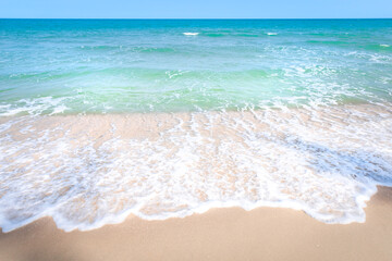 Fototapeta na wymiar Sea wave on beach with white sand, nature background