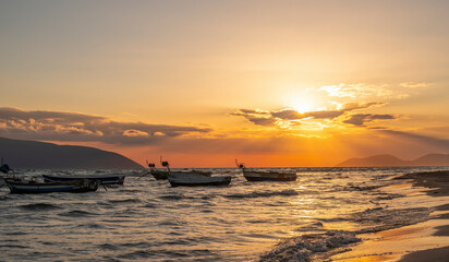 Beautiful fishing boats at sunset at the adriatic sea.