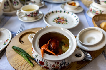 still life with food on a white plate on a white table on a sunny veranda 