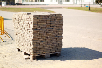 Construction material. Brick. Tile for the road.