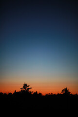 Beautiful colour night sky river. Bright moon. Clouds and stars in high mountains.