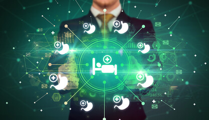 Hand holding healthcare icons concept