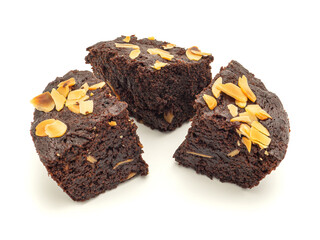 Pieces of fresh brownies on white background. Close-up photo. Delicious chocolate pie. Dessert and...