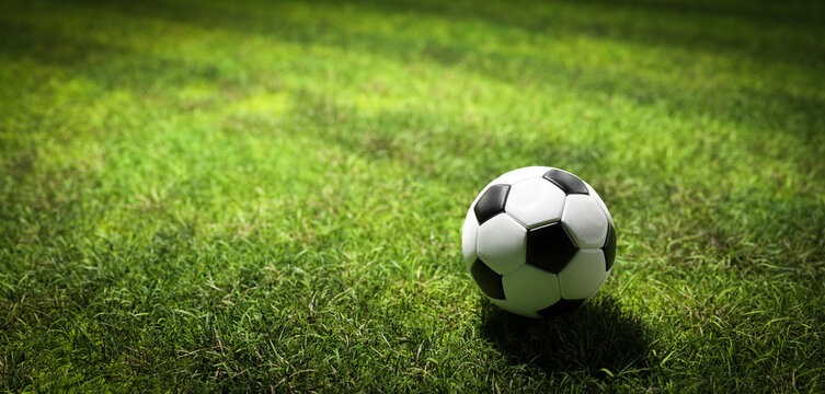 Football Soccer Ball On Grass Field