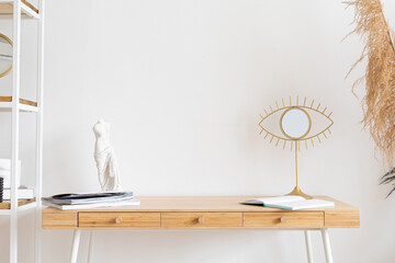 Trendy white living room with modern decoration, simple home decor © uv_group