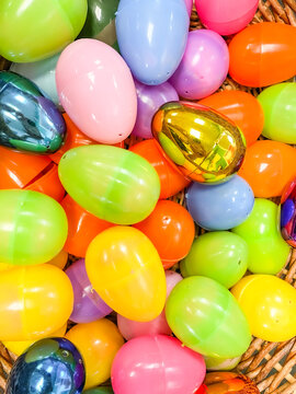 Plastic Easter Eggs in a wicker basket