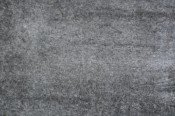 the surface of the gray wall forming a blank background