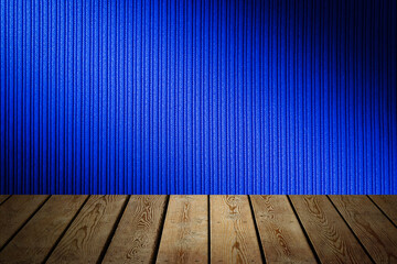 The background is blank wooden boards and a textured striped wall with gradient lighting and vignetting.