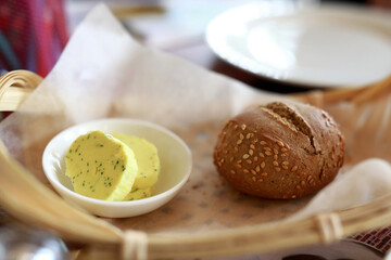 Bun and butter in basket