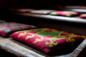 Tapestry Kneelers in a Church