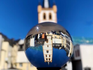 St. Gangolf church tower - the tallest in Trier, Rhineland-Palatinate, Germany. Distorted upside...