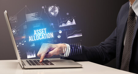 Businessman working on laptop, business concept