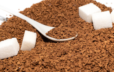 Coffee. Sugar. A spoon with coffee granules. Instant coffee close-up.