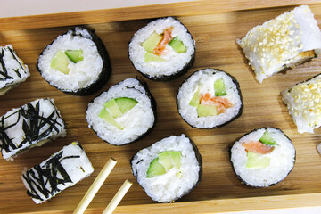 Fried rolls, classic on a wooden tray.