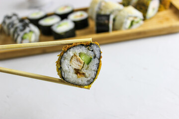 Fried rolls, classic on a wooden tray.