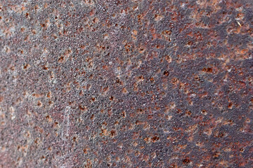 Rusty iron background with speckles and dirt