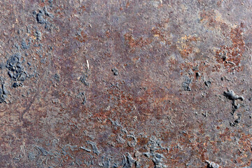 Rusty iron background with speckles and dirt