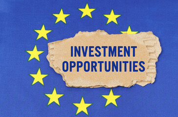 There is a cardboard box on the EU flag that says- INVESTMENT OPPORTUNITIES
