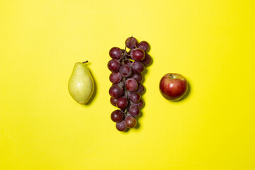 Fruit on a yellow background. Healthy diet. Fresh fruits isolated. fruit theme