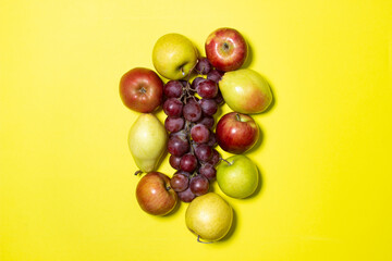 Fruit on a yellow background. Healthy diet. Fresh fruits isolated. fruit theme