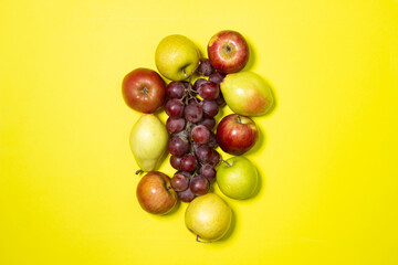 Fruit on a yellow background. Healthy diet. Fresh fruits isolated. fruit theme