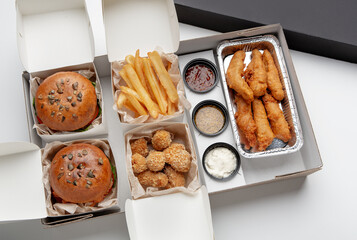 Lunch at workplace in office or home during COVID-19 virus, fast food delivery