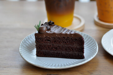 chocolate cake or layer cake and drink