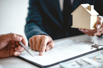 Business people signing contract making a deal with real estate agent Concept for consultant and home insurance concept.
