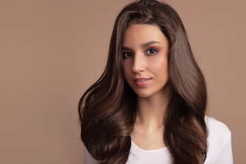 Portrait of a woman with luxurious hair and a beautiful smile. Asian appearance