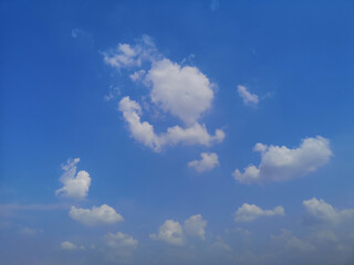 Cumulus white clouds in the blue sky natural background beautiful nature space for write
