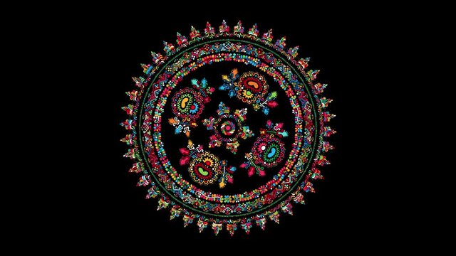 Decorative rotating icon with traditional Hungarian embroidery symbols. Seamless loop over black background.