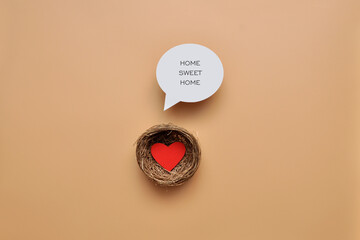 A nest with a heart inside. A symbol of home, hearth and happy family
