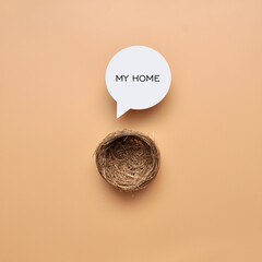 Nest and inscription: my home. A symbol of home, hearth and happy family