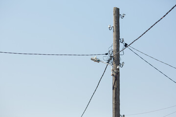Pole with power wires. Pole and wires.