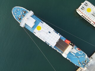 Aerial Shot of Hermes Corfu Lines Cruise Ship Docked In Port Of Igoumenitsa City In Greece....