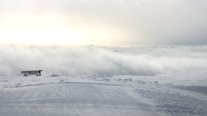 view from a mountain above the clouds during holiday