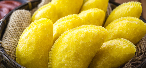 breaded fried corn, typical pastry of south america, with flour and stuffed with meat