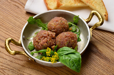 A plated dish of Ahi Tuna Tartar and toasted bread