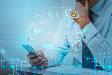 Businessman hand using phone, a digital globe hologram with network icons