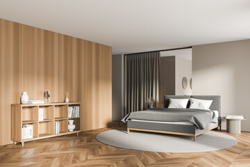Contemporary cozy bedroom interior with large comfortable grey bed © ImageFlow