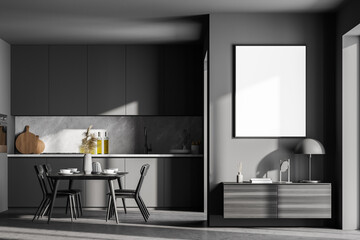 Dark cozy kitchen room interior with dining table and cupboard