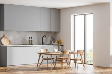 Corner view of bright kitchen room interior with panoramic window