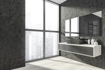 Bathroom interior with sink and mirror on dark grey wall near window