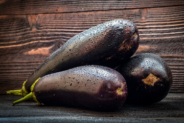 eggplants on wooden desk table