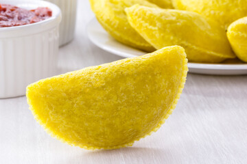 breaded fried corn, typical pastry of south america, with flour and stuffed with meat