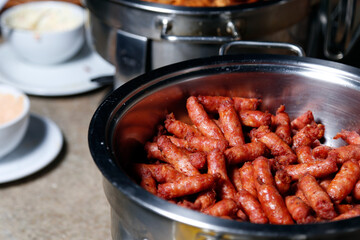 spicy sausage served in pan