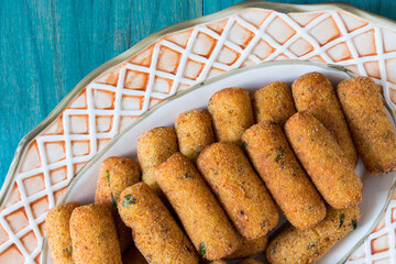 Vegetarian potato croquettes served in a serving dish