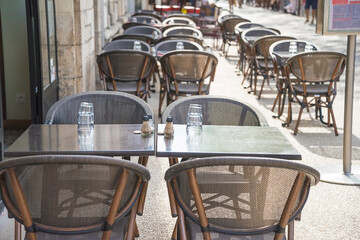 Empty restaurant with table settings outdoors